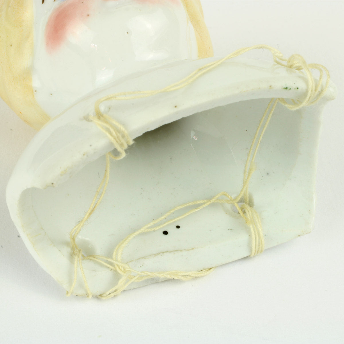 Dukkehoved af porcelæn