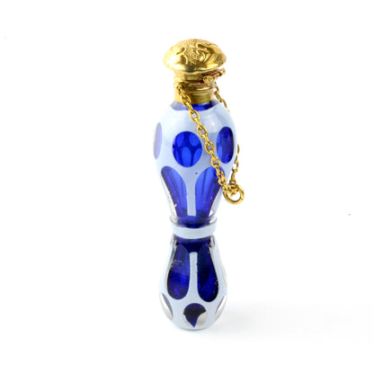 parfume flaske fremstillet i blåt, klart og hvidt glas