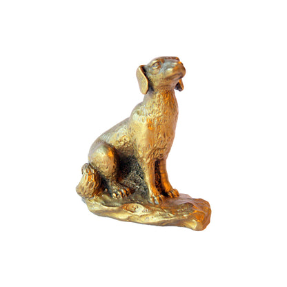 Lille bronzefigur forestillende hund der venter på en godbid