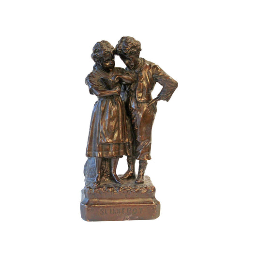 Figur fremstillet af bronze patineret gips forestillende pige