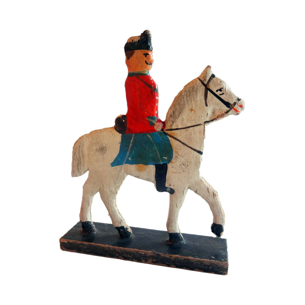 Legetøjsfigur forestillende dansk soldat riddende på hest