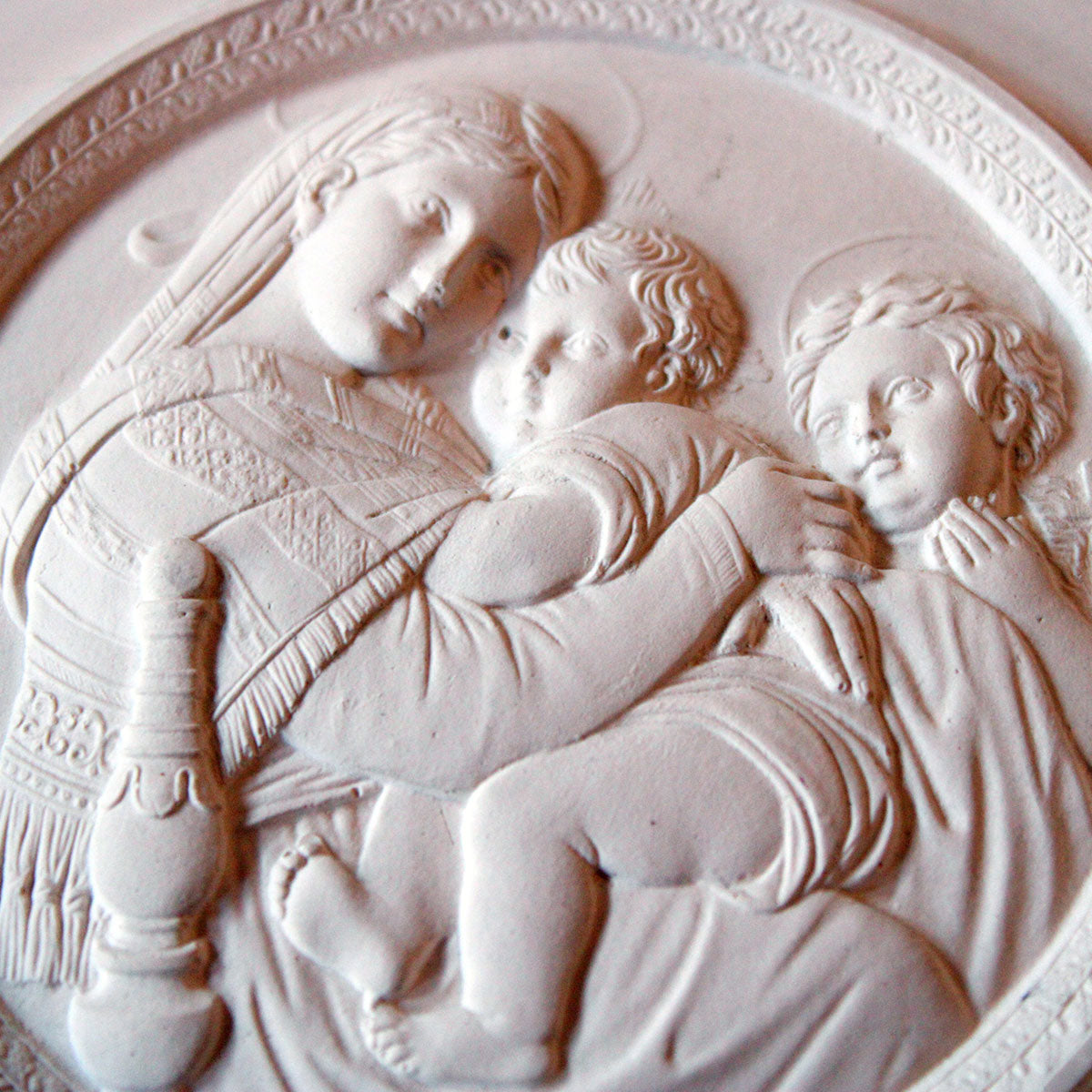 Jomfru Maria siddende med Jesus barnet sammen med Johannes